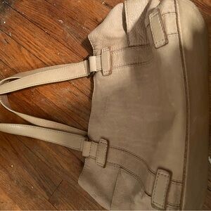 Tan Structured Tote Bag with Sturdy Handles and Decorative Straps